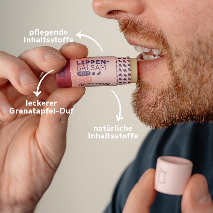 Renate Granatapfel Lippenbalsam wird auf Lippe aufgetragen USPs Mann